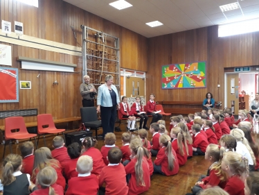 Heather Wheeler MP addressing pupils at Coton-in-the-Elms Primary School