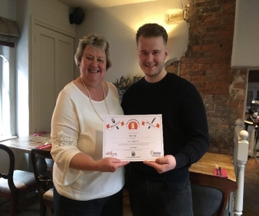 Heather Wheeler MP presents Award to Rob Taylor