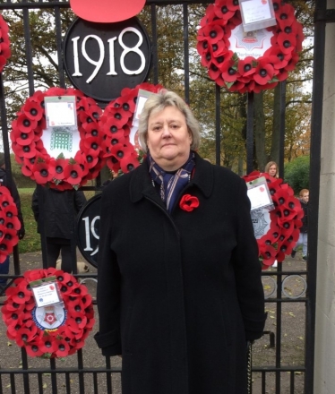 Heather Standing at Remembrance Service